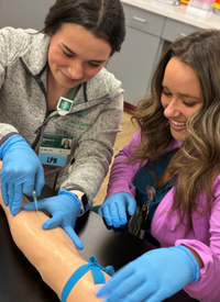 NLH LPN practices inserting IV on manikin 