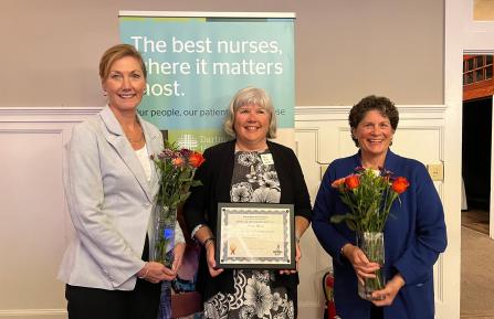 Karen F. Clements, BSN, MSB, MHCDS, RN, FACHE; Pamela J. Rice, BSN, RN-PCNB; and Sally Patton, MSN, RN, holding flowers and their award certificate 