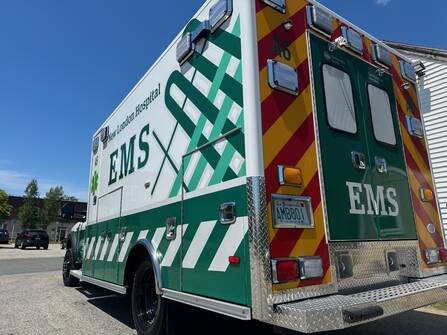 A photo of a NLH ambulance from behind