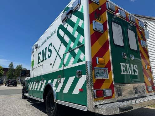 A photo of a NLH ambulance from behind 